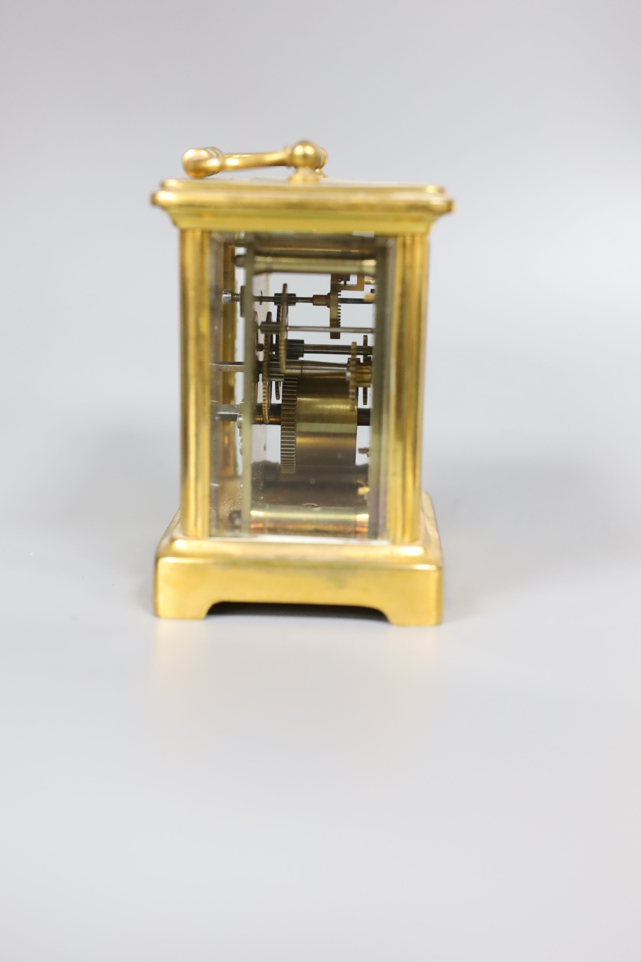 A small French brass carriage timepiece, 12cm